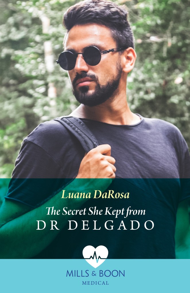 Cover of The Secret She Kept from Dr Delgado by Luana DaRosa – Latino man in his 30s wearing sunglasses